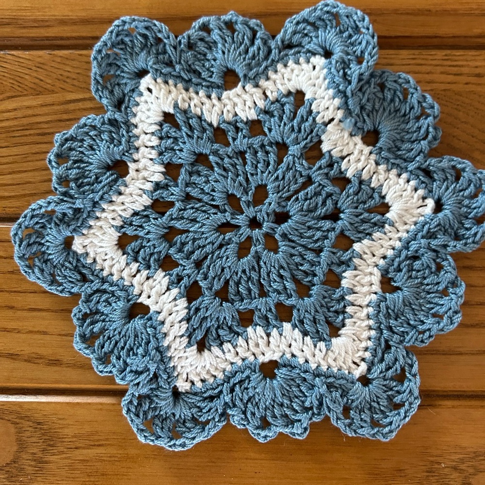 Intricate Blue and White Crochet Doily. 7”